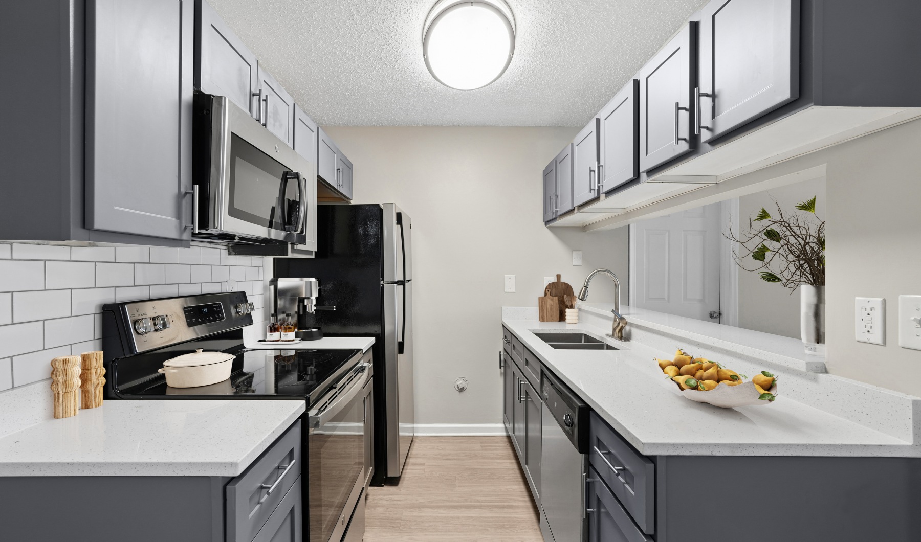 Spacious kitchen with blue cabinets