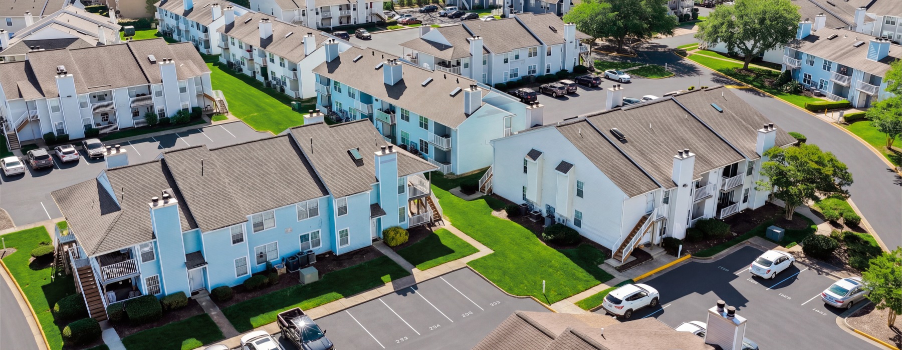 Drone view of many apartments spread out