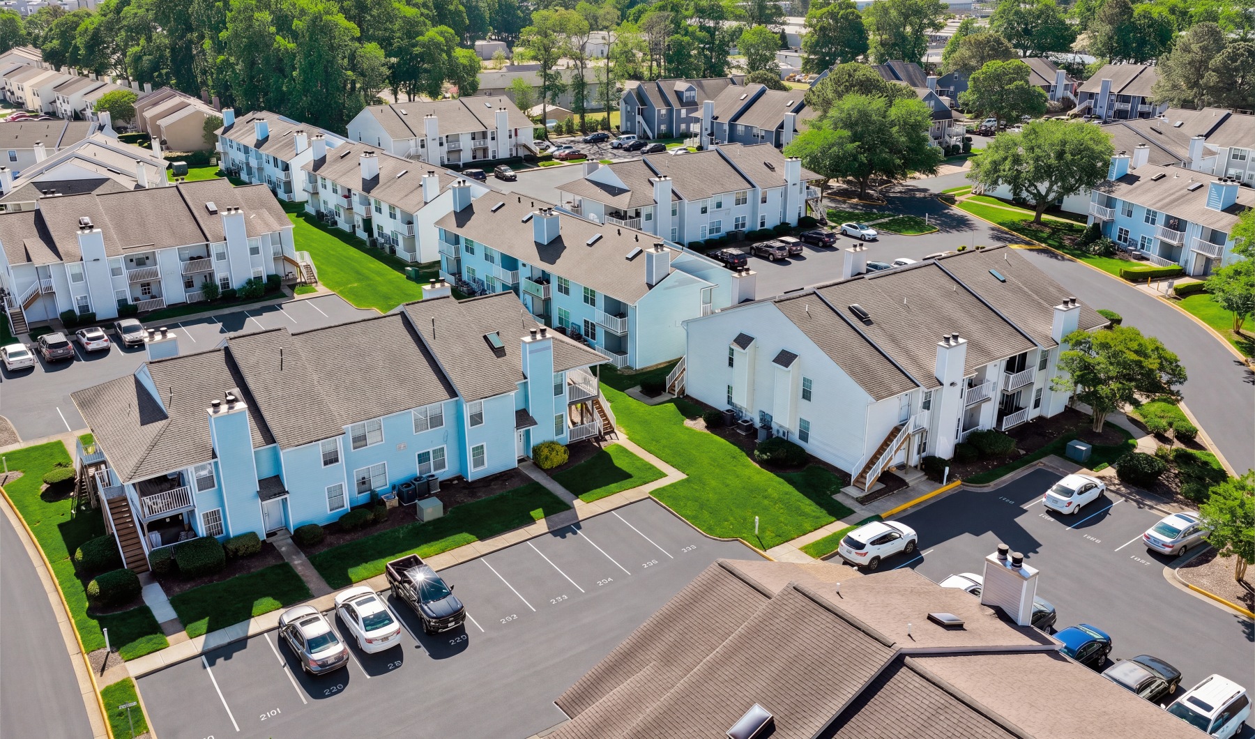 Drone view of many apartments spread out