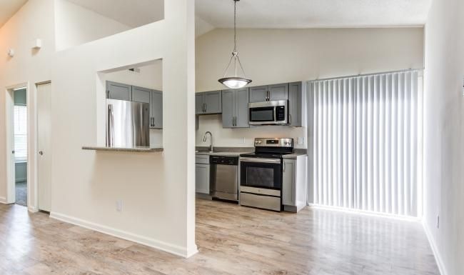 a kitchen with stainless steel appliances